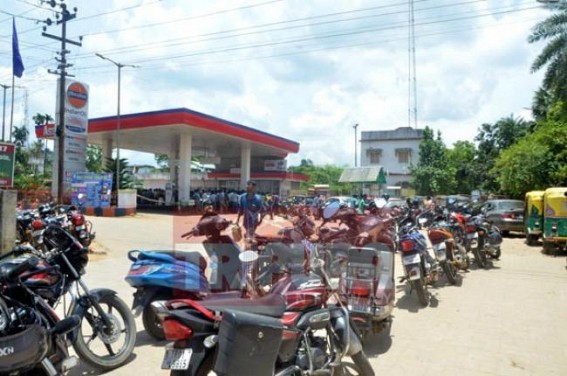 Petrol crisis haunts people of Tripura for the third consecutive day, people waits in 1-2km long que in front of the petrol pumps for refilling their vehicle tanks, crisis leads to chaos across the state, government reluctant to look for any solution